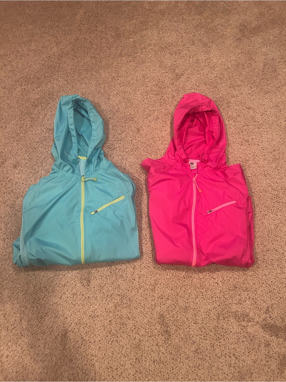 2 lightweight Hooded WindbreakersJacket -   Pink small/Blue medium